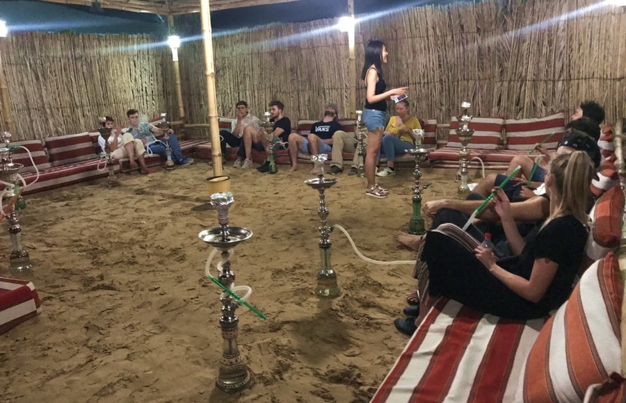 Smoking shisha in the cosy corner of the dubai camp