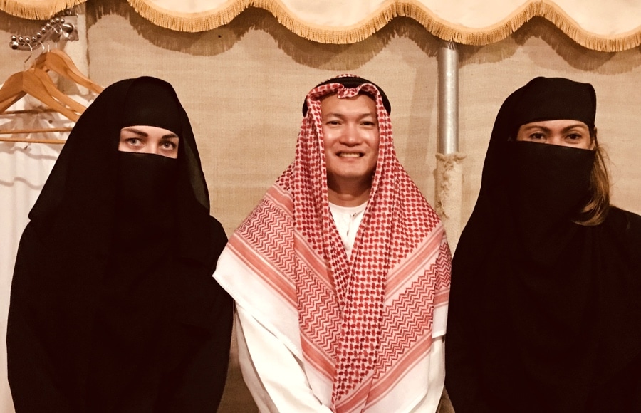 Trying traditional Arabic clothes